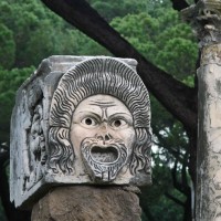 Gaze on amazing sculptures of classical theatrical masks in Ostia's theatre