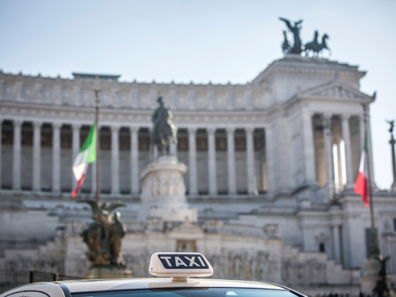 Rent white legal taxi in Rome