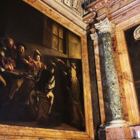 Be transported back to the world of 17th century Rome in Caravaggio's stunning Calling of Saint Matthew