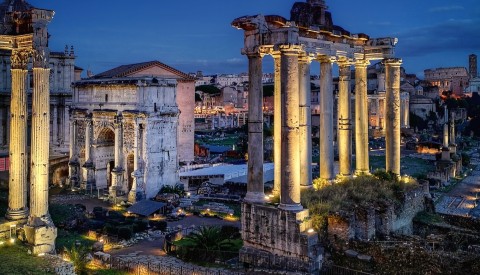 Gaze down into the spectacular remains of the Roman Forum beautifully lit in the night sky