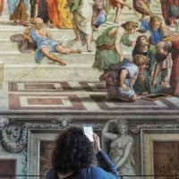 Admire the work of Raphael in the School of Athens