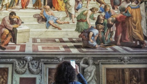 Gaze on Raphael's extraordinary School of Athens on our Vatican tour