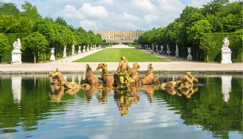 The god Apollo keeps watch over Versailles, over all of France.