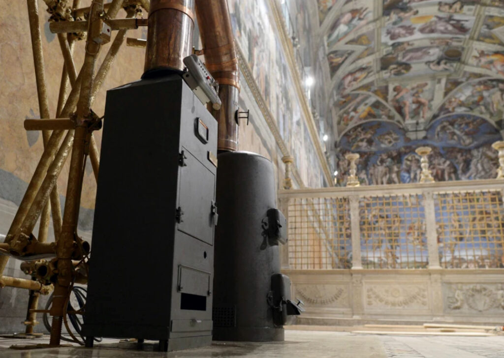The temporary stoves are placed in the Sistine Chapel to produce the smoke for the expectant crowds
