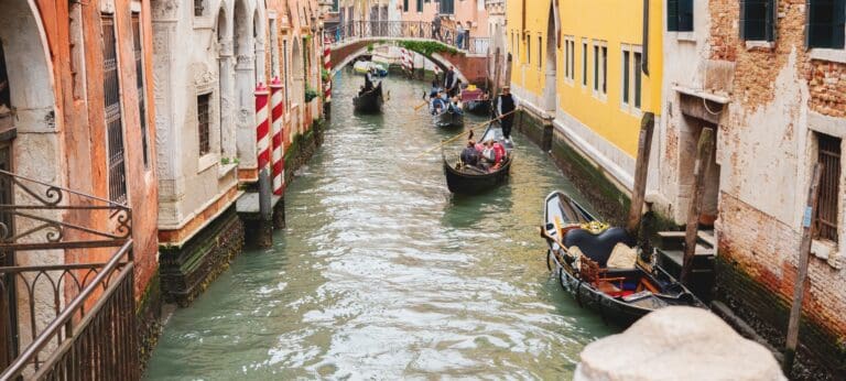 The canals of Venice with gondoliers