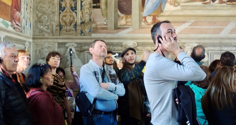 tourists visiting vatican museum