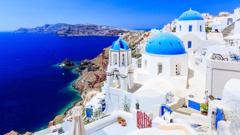 the blue roofed properties of Santorini