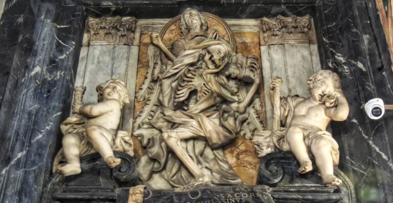 Funeral monument to to Camillo del Corno in the church of the Gesù Rome showing a skeleton representing death holding an hourglass representing the passage of time.