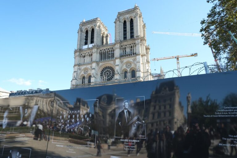 hoardings in front of notre dame cathedral in paris