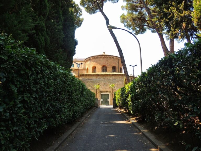 View of Santa Constanza down a bushy avenue