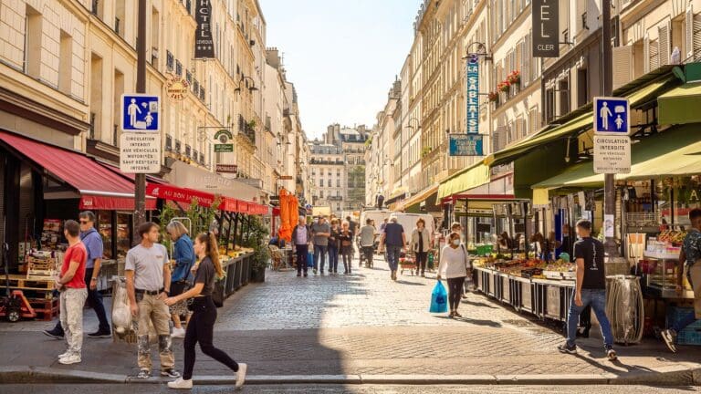 a view of a typical bustling street in paris