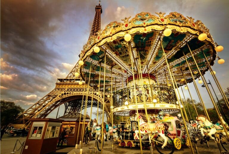 Eiffel Tower in Paris with a vintage carousel in the foreground