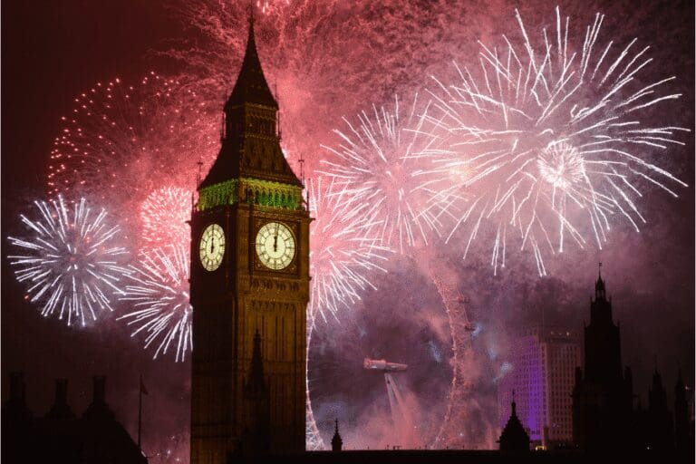fireworks explode behind Big Ben