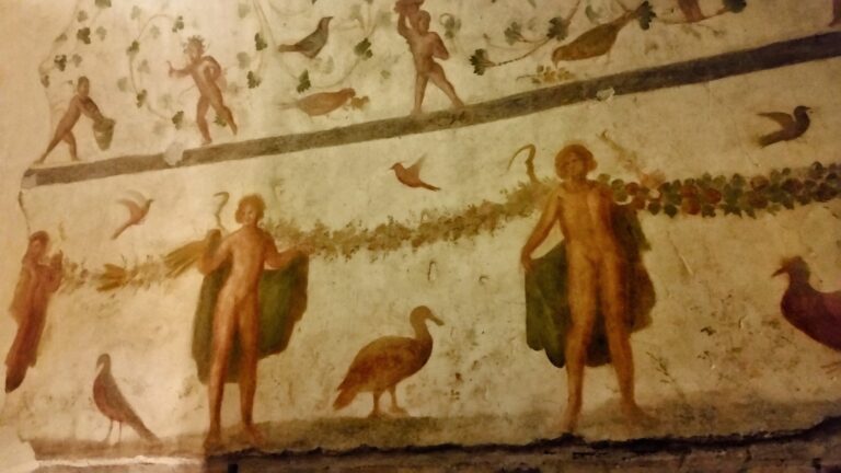 Ancient fresco with pagan imagery in the ctacombs of Domitilla in Rome