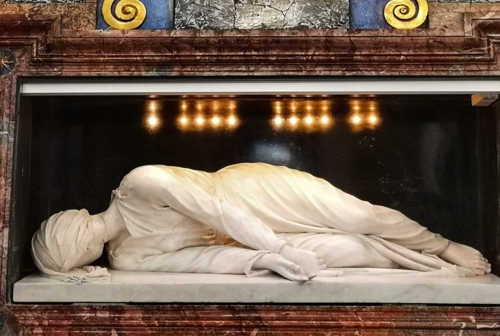 Carlo Maderno's poignant marble sculpture of St Cecilia under the main altar of the church of Santa Cecilia in Trastevere Rome