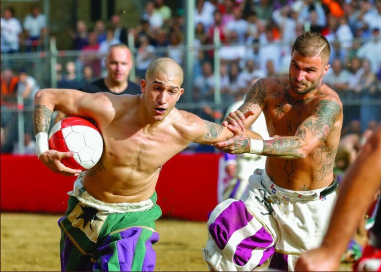 Calcio Storico in Florence, players jostle for the ball