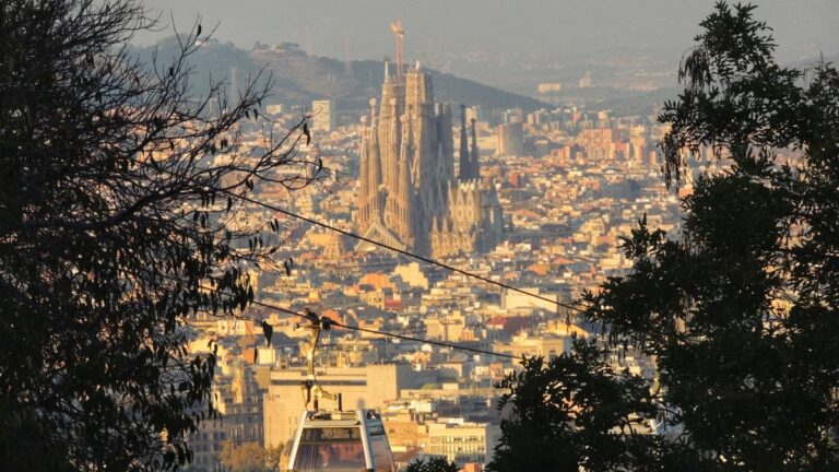 view of sagradda familia from montjuic hill