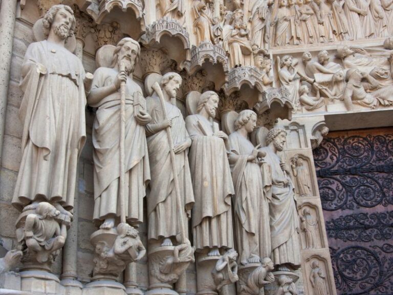 incredible sculptures decorating the facade of notre dame cathedral