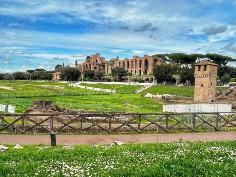 a view of the palatine hill with the circus maximus in the foreground