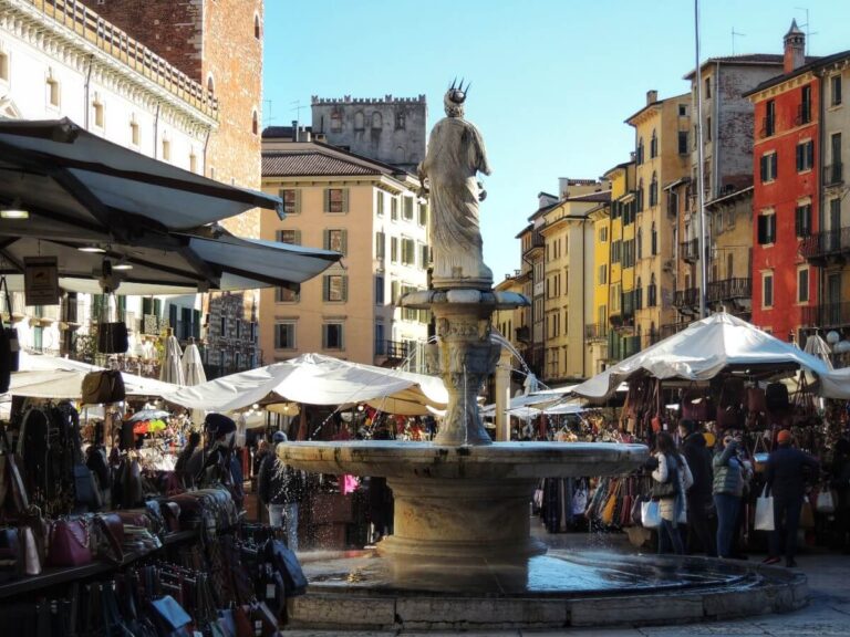 Stroll through Piazza delle Erbe and surrounds