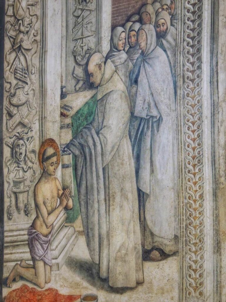 Fresco detail in the Bufalini Chapel showing the ordination of st. Bernardino receiving the robes of the Francisan order