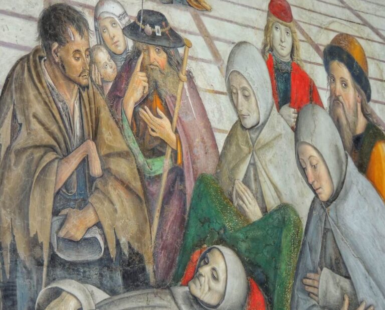 Fresco detail in the Bufalini Chapel showing St. Bernardino laid out on a bier for the funeral with the artist Pinturicchio's self portrait appearing as an individual in a red cap