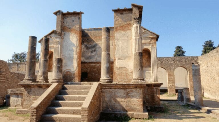 Temple of Isis in Pompeii showing a frontal staircase leading up to the cella of the temple