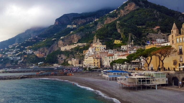 the beach at positano wreathed in clouds