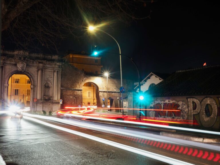 a roman road at night
