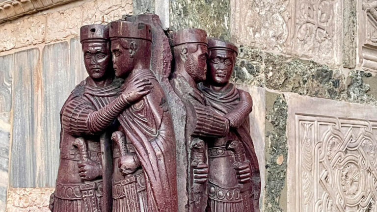 the tetrarchs sculpture on the exterior of saint mark's