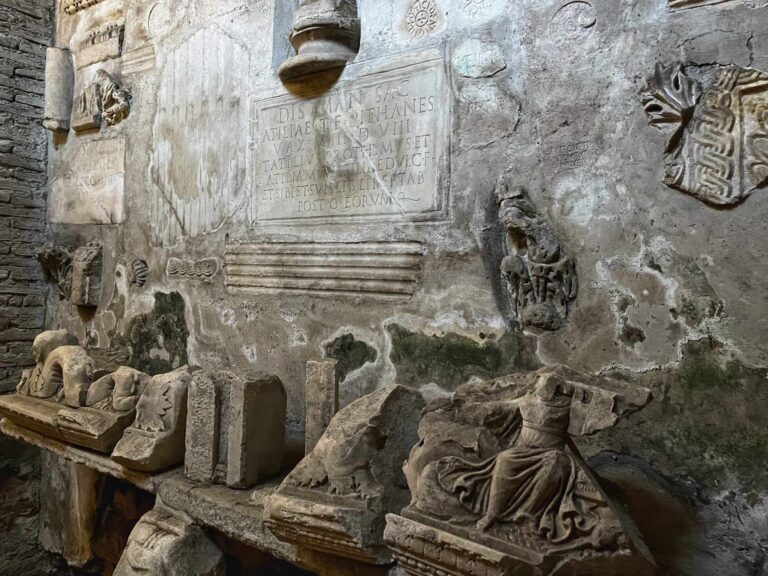 Ancient marble fragments recycled into the walls of the lower basilica of San Clemente in Rome