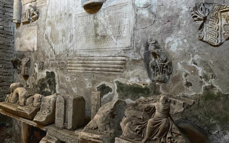 Marble architectural fragments in the lower part of the Basilica of San Clemente in Rome