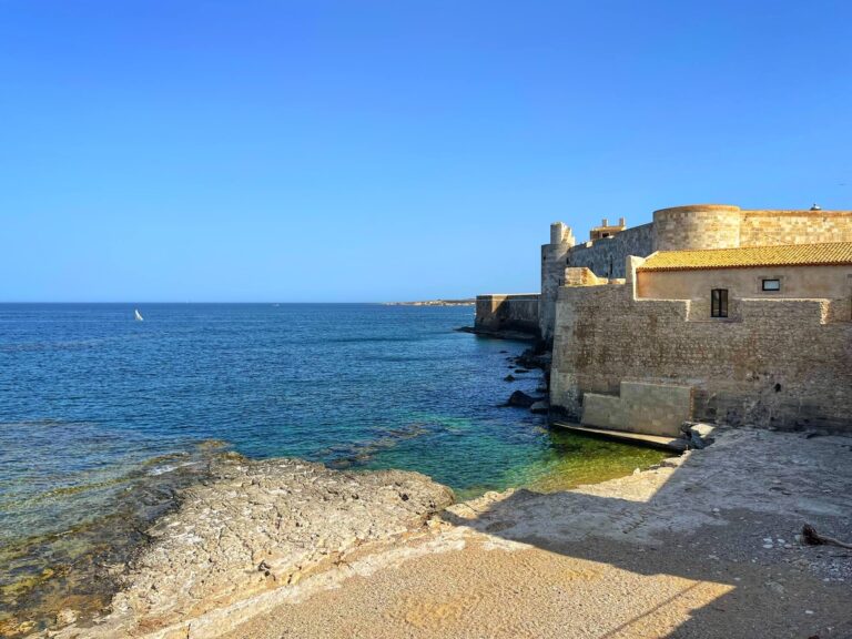 the waterfront castello maniace in syracuse