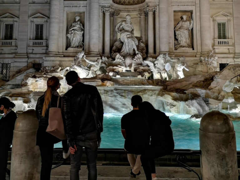 toss your coins into the trevi fountain
