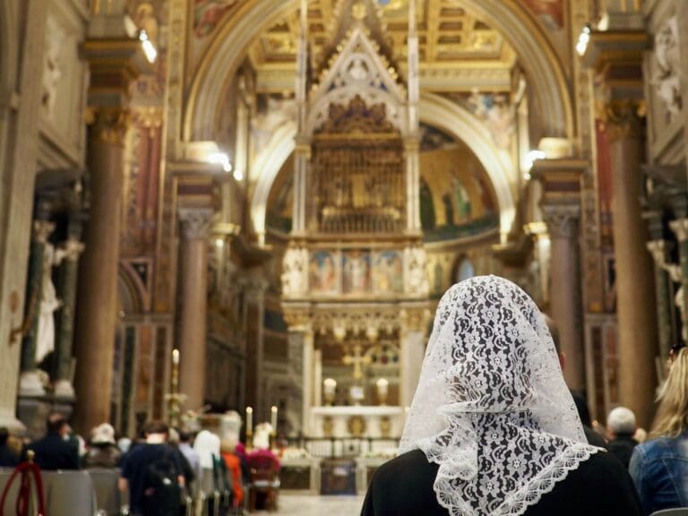 a nun attends a mass in san giovanni in laterano