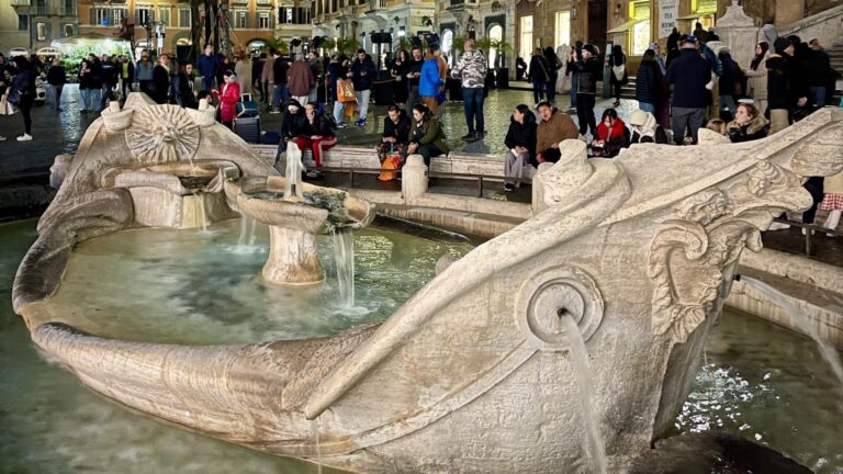 the barcacia fountain at the base of the spanish steps