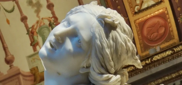 detail of persephone by bernini in the borghese gallery