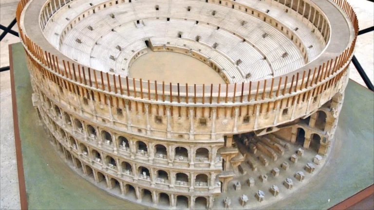reconstruction of the colosseum showing the wooden poles that supported the velarium