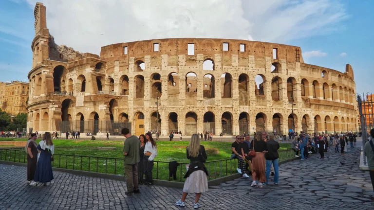 a view of the colosseum in rome from piazza del colosseo