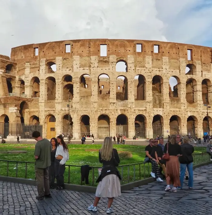 a view of the colosseum in rome from piazza del colosseo