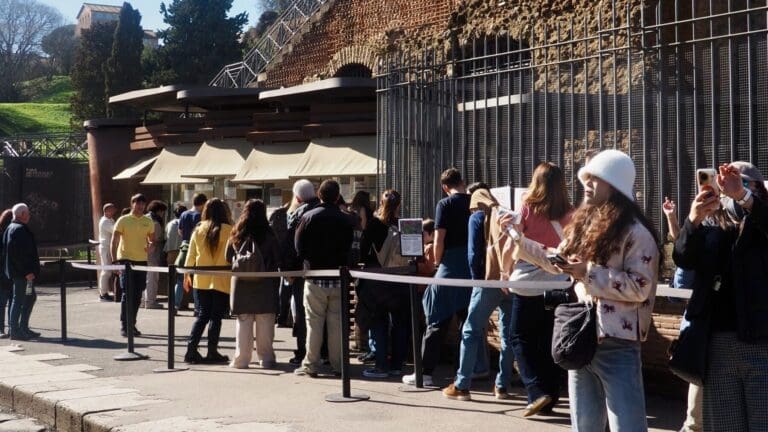 a ticket line snakes around the ticket office at the colosseum