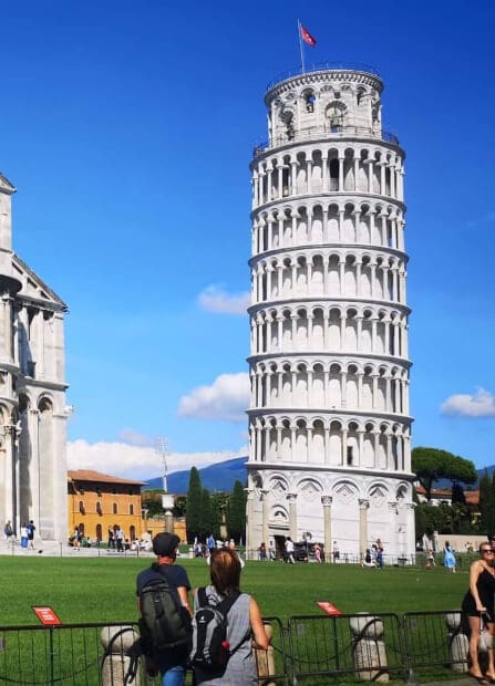 a view over pisa's campo dei miracoli with the cathedral in the foreground