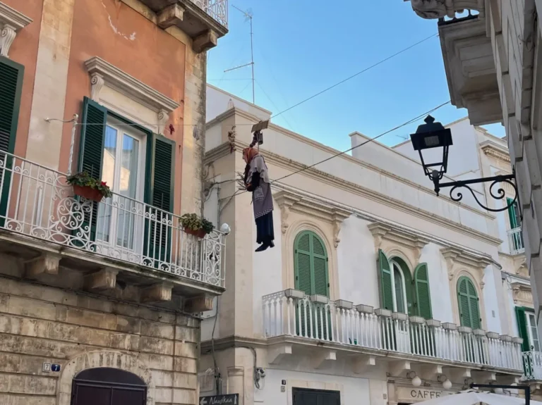the quarantena supsended above the street in martina franca