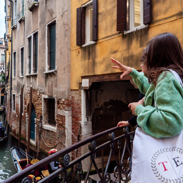 A Through Eternity Guide leads a tour through Venice