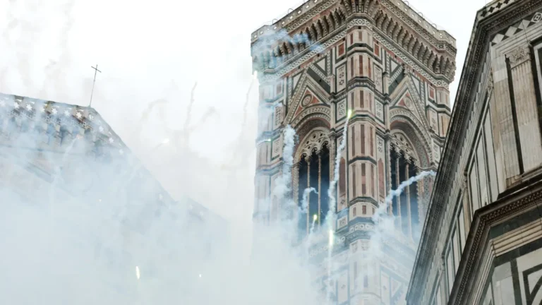 fireworks ignite in front of florence cathedral during the scoppio del carro